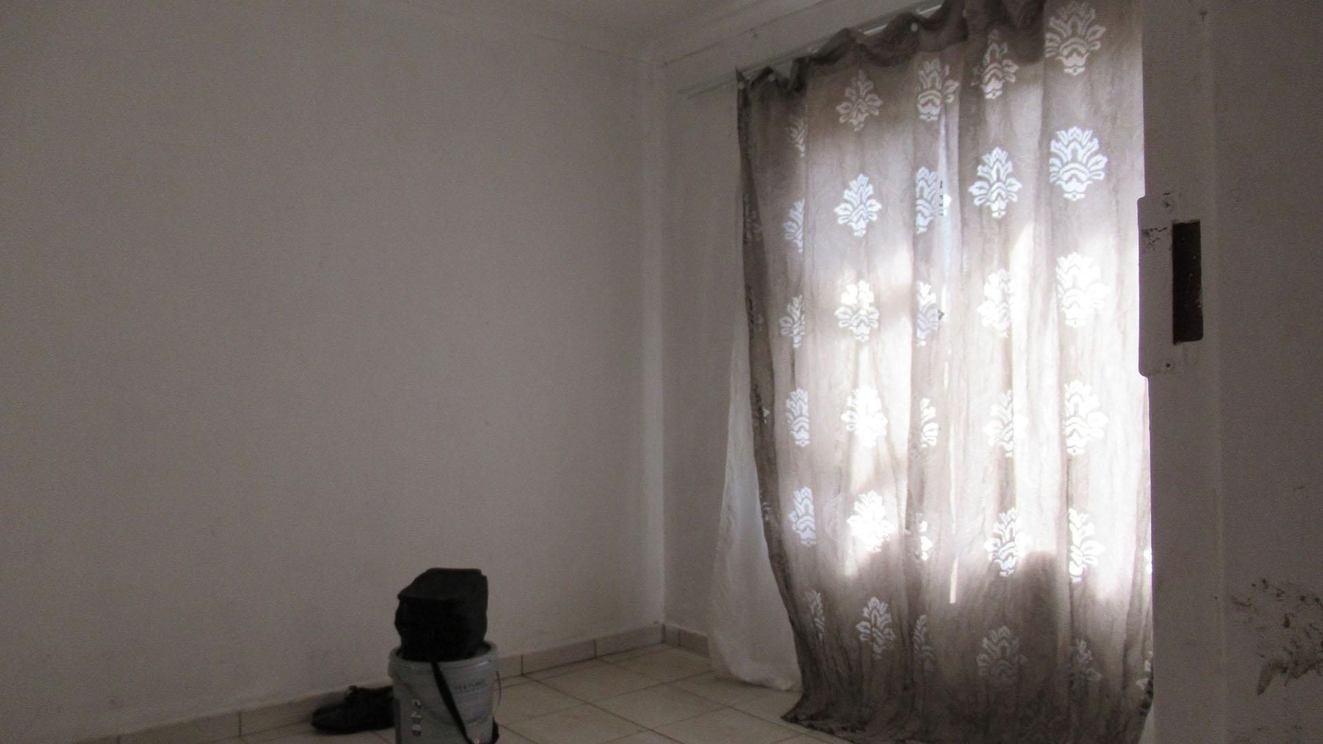 Bed Room 1 - 11 square meters of property in Westonaria