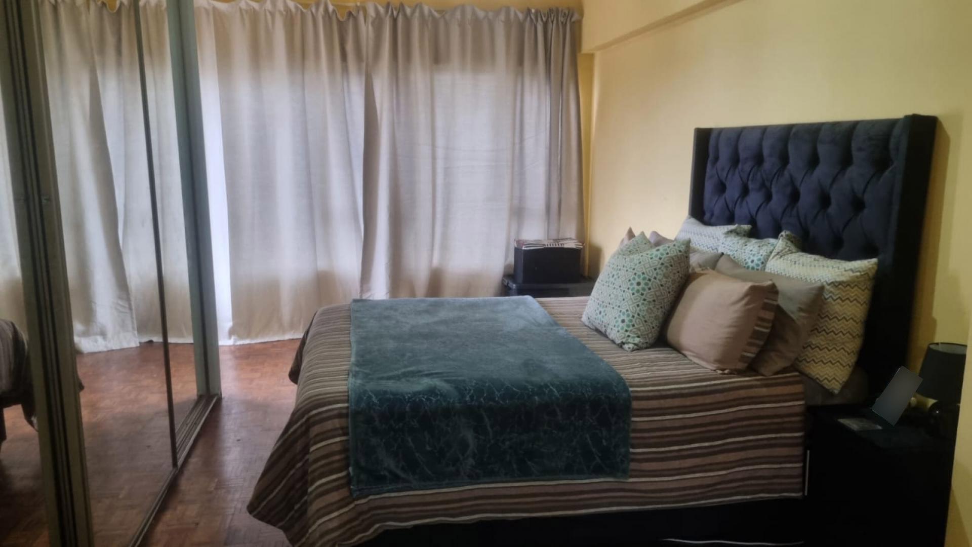 Bed Room 1 of property in Durban Central
