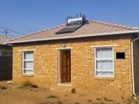 Front View of property in Devland