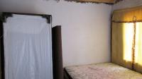 Bed Room 1 - 21 square meters of property in Protea Glen