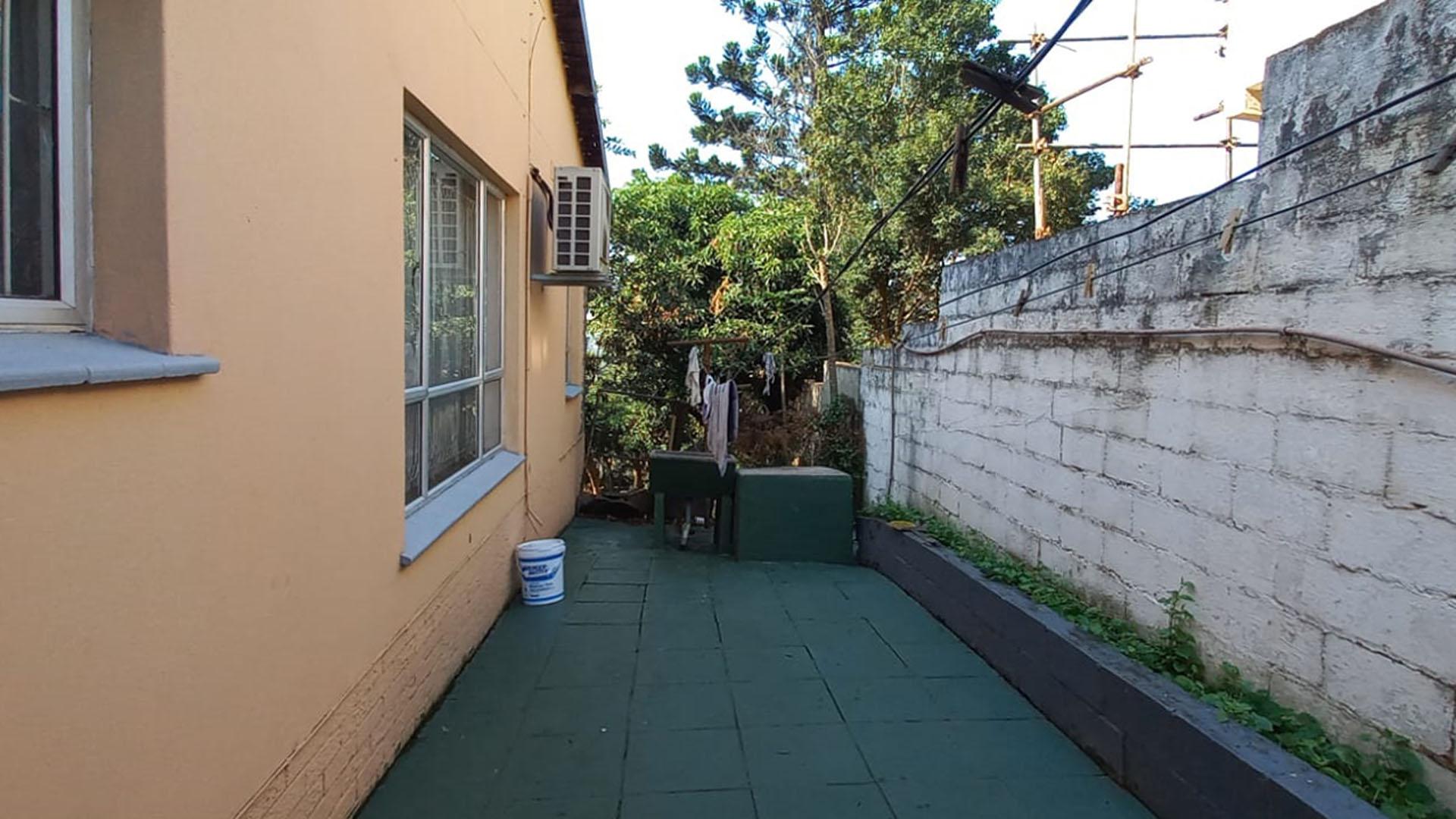 Backyard of property in Lotusville