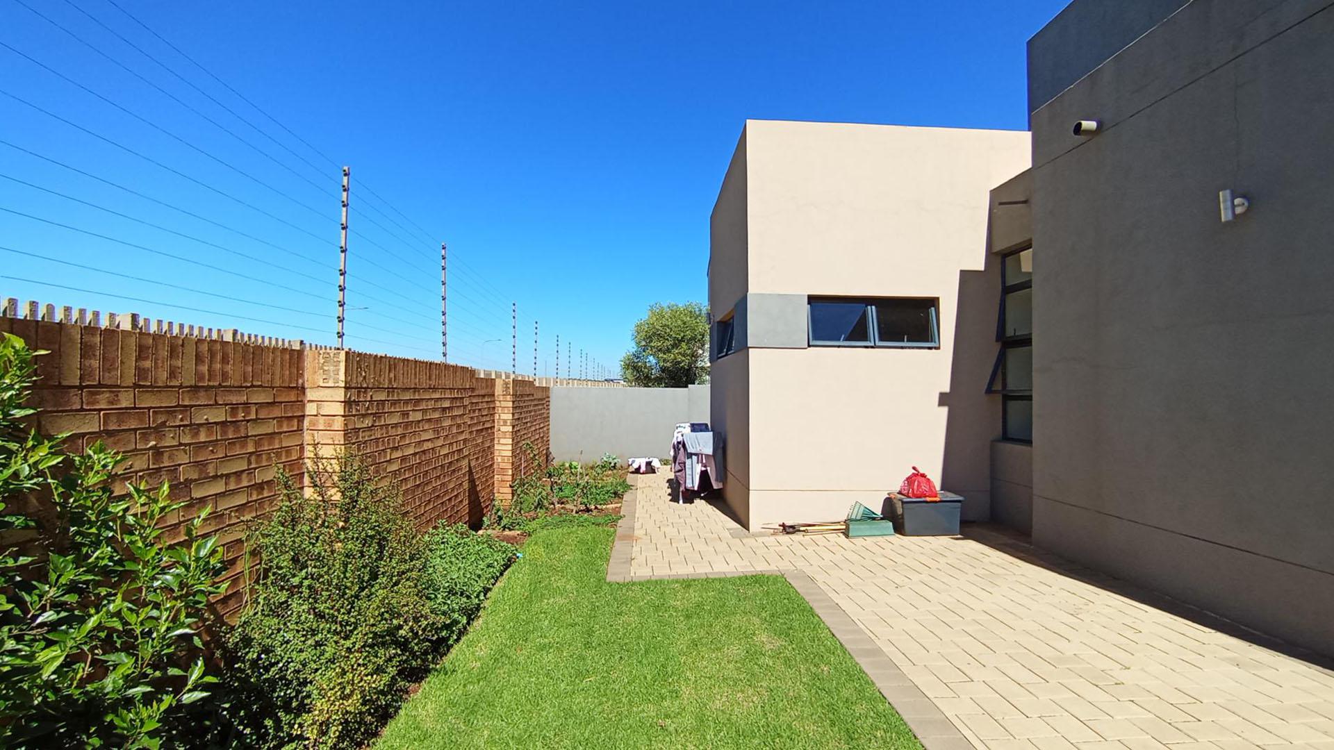 Backyard of property in Midstream Estate