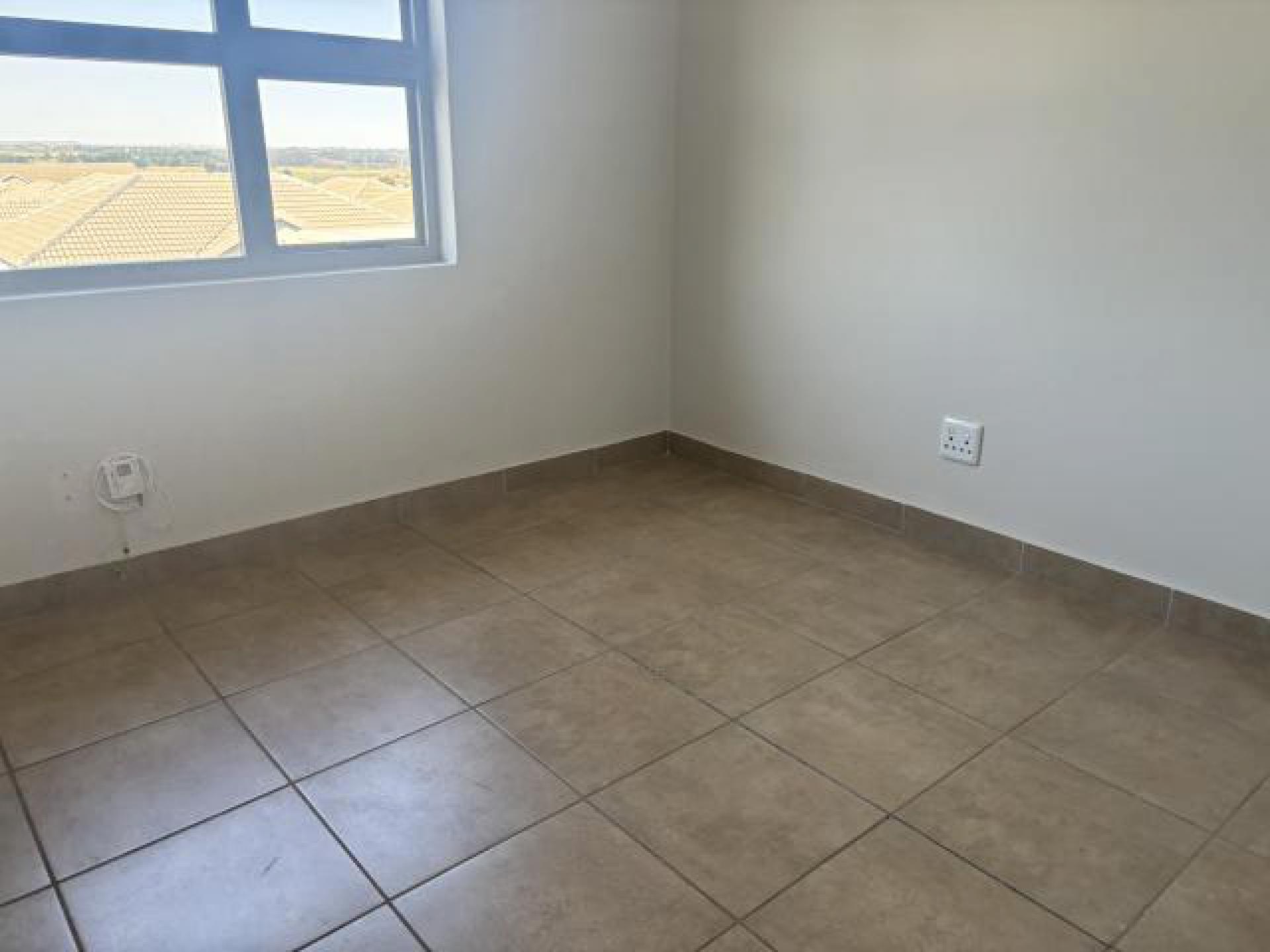 Bed Room 1 of property in Dixon AH (South View)