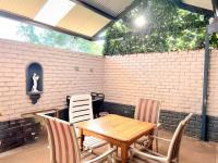 Patio of property in Waterkloof Ridge