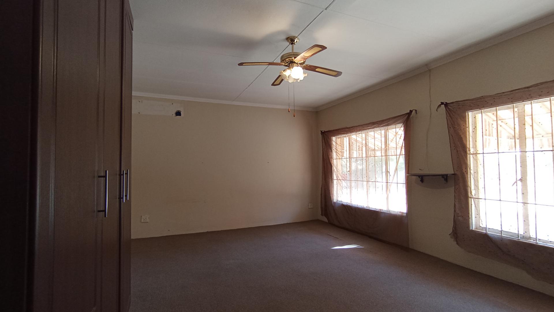 Bed Room 1 - 62 square meters of property in Pretoria Rural