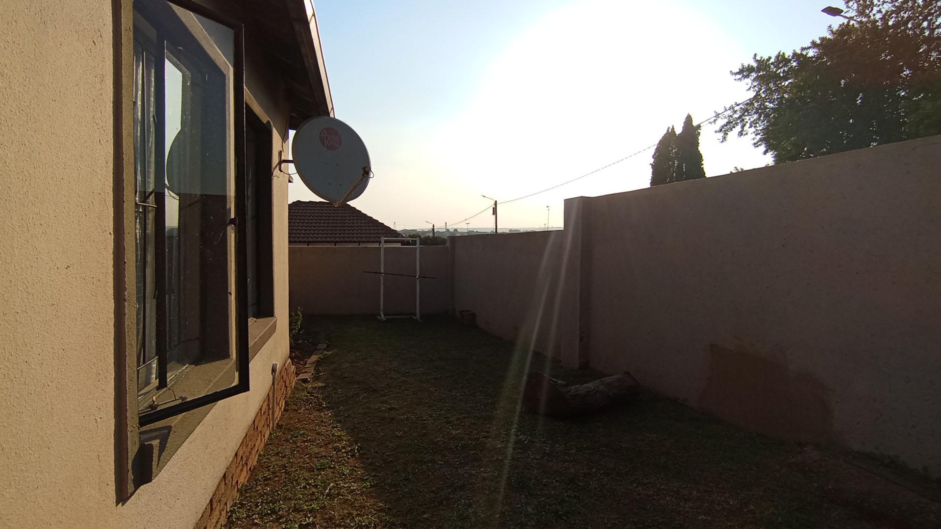 Backyard of property in Clayville