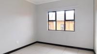 Main Bedroom - 18 square meters of property in Rooihuiskraal North