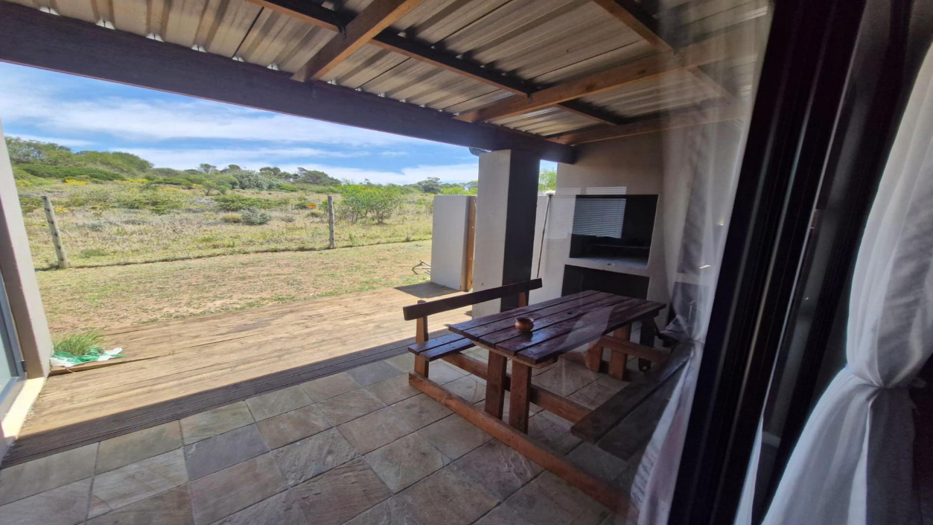 Patio of property in Kidds Beach