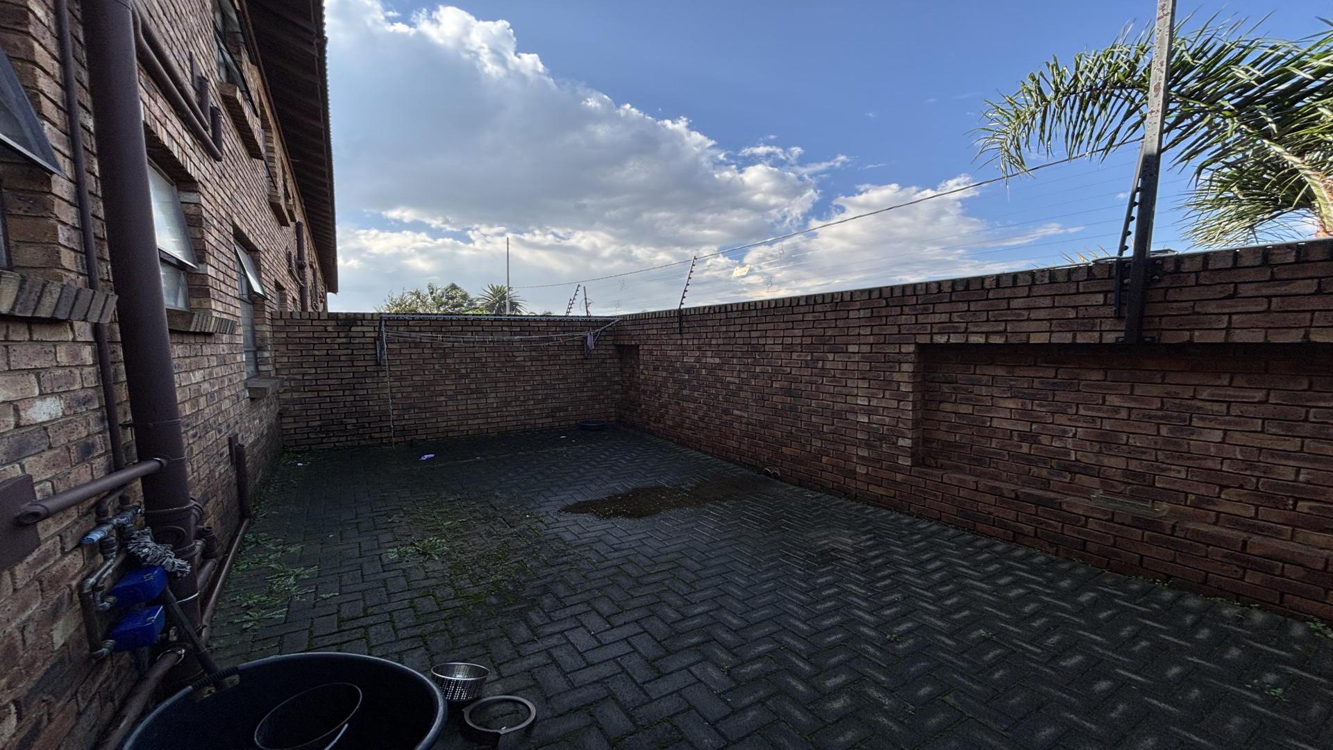 Backyard of property in Norton's Home Estates