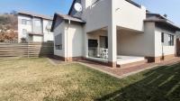 Backyard of property in Amorosa