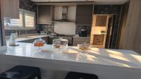 Kitchen of property in Escombe 