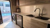 Kitchen of property in Escombe 