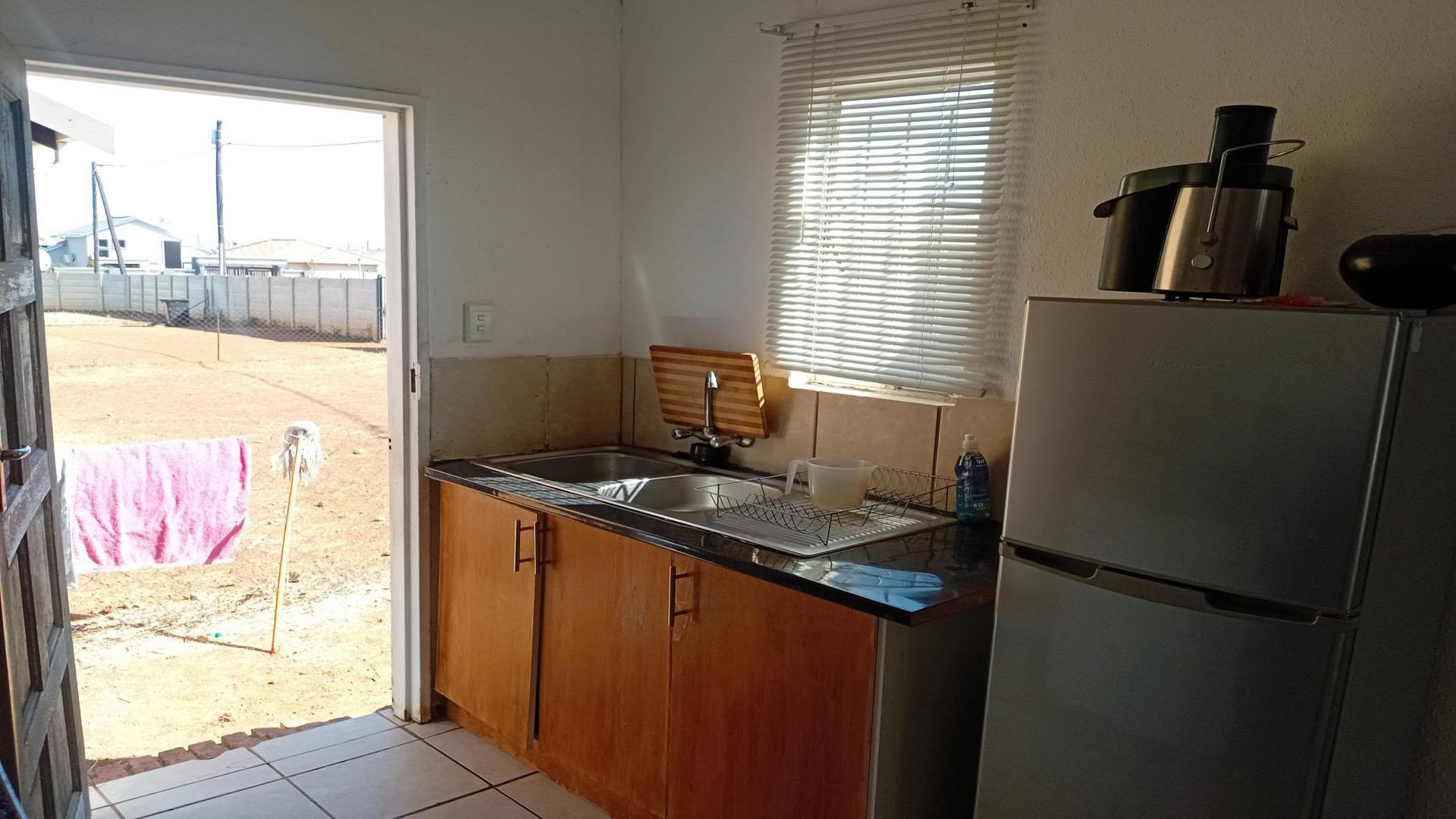 Kitchen of property in Savanna City