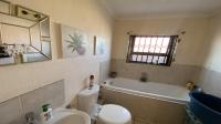 Bathroom 1 of property in Hlanganani Village