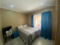 Bed Room 2 of property in Mooikloof Ridge