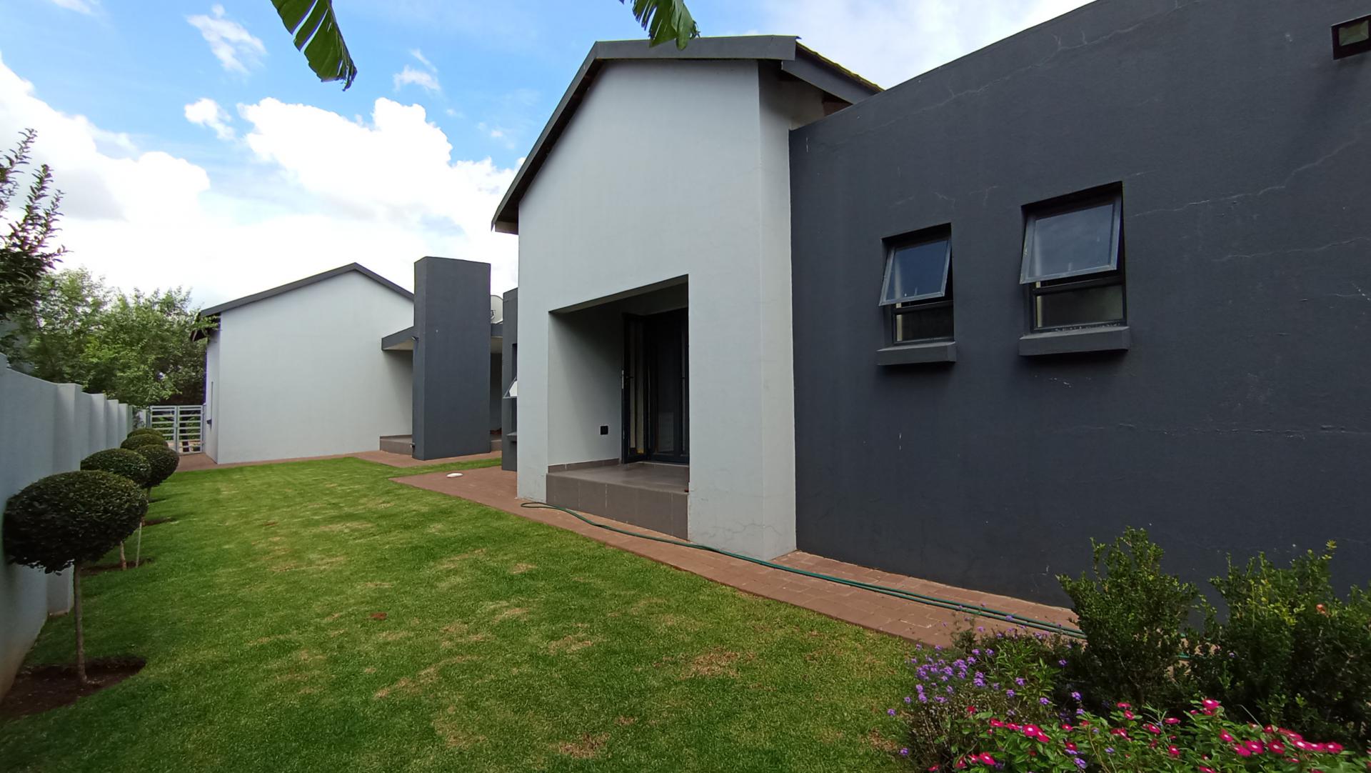 Backyard of property in Copperleaf Golf and Country Estate