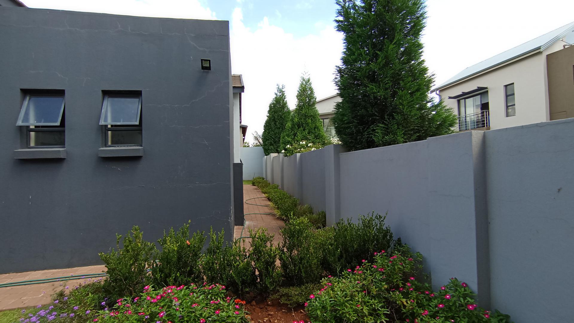 Backyard of property in Copperleaf Golf and Country Estate