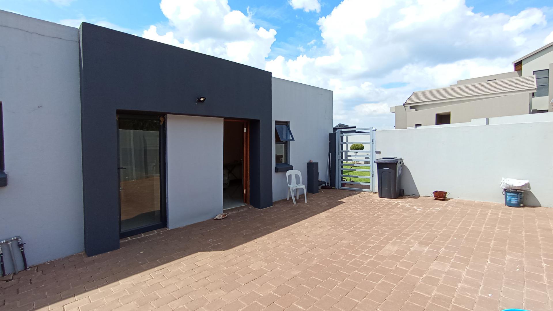 Backyard of property in Copperleaf Golf and Country Estate