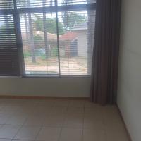 Main Bedroom of property in Waterkloof Glen