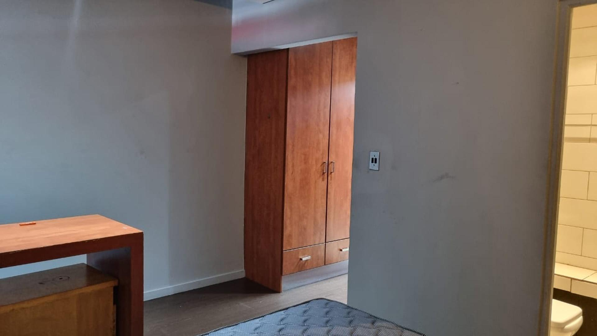 Bed Room 1 of property in Braamfontein