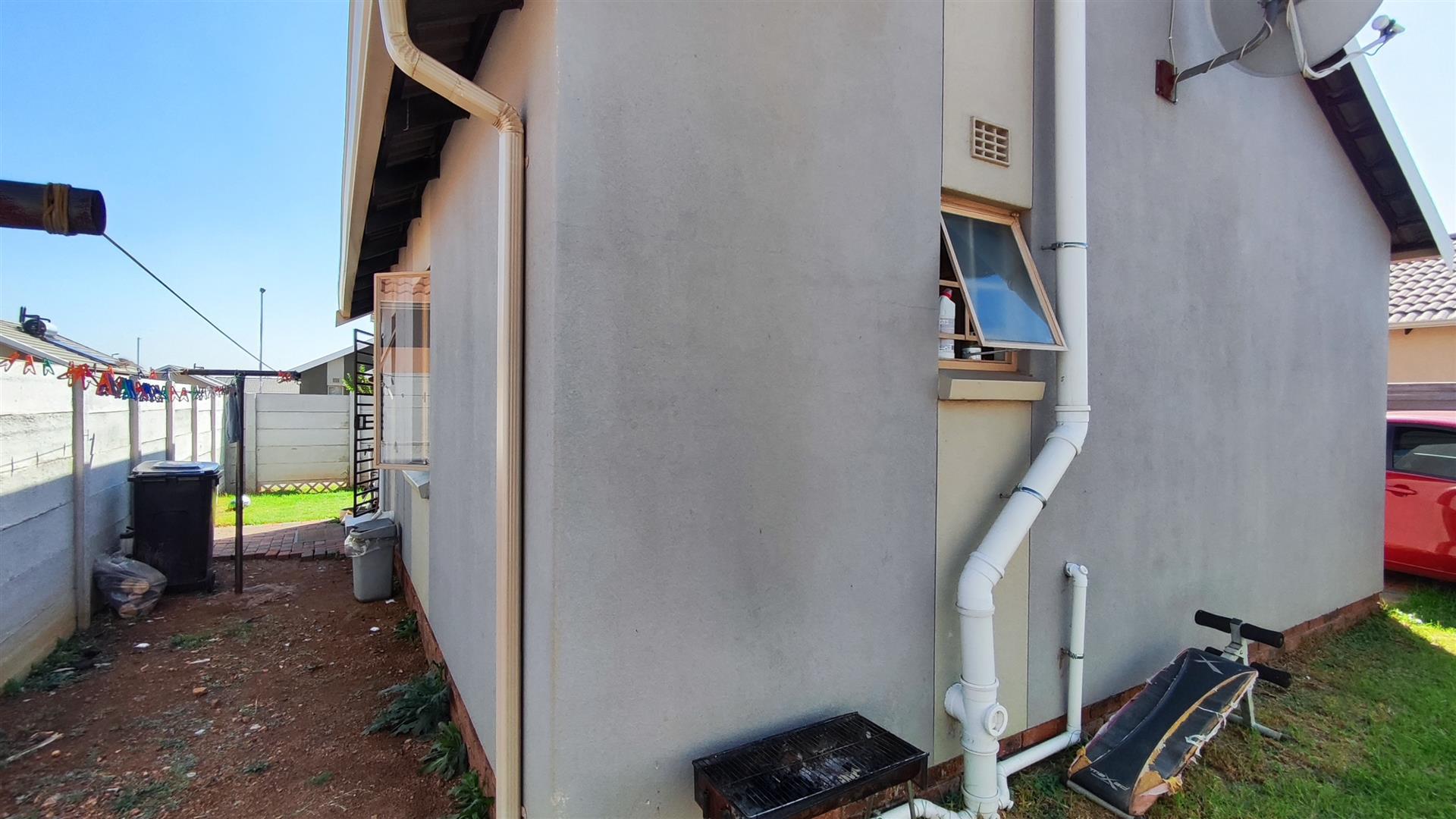 Backyard of property in Palm Ridge