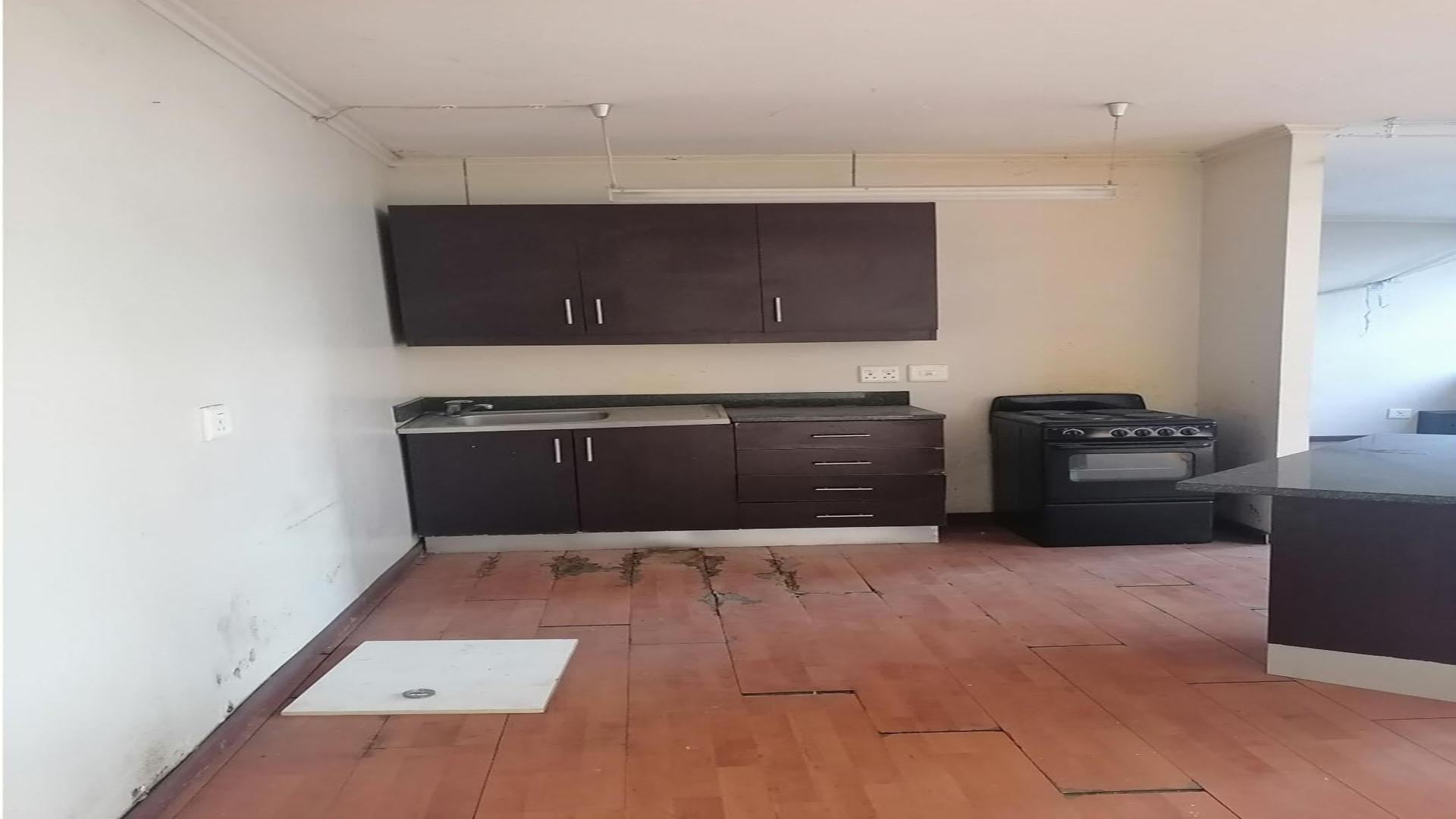 Kitchen of property in Johannesburg Central