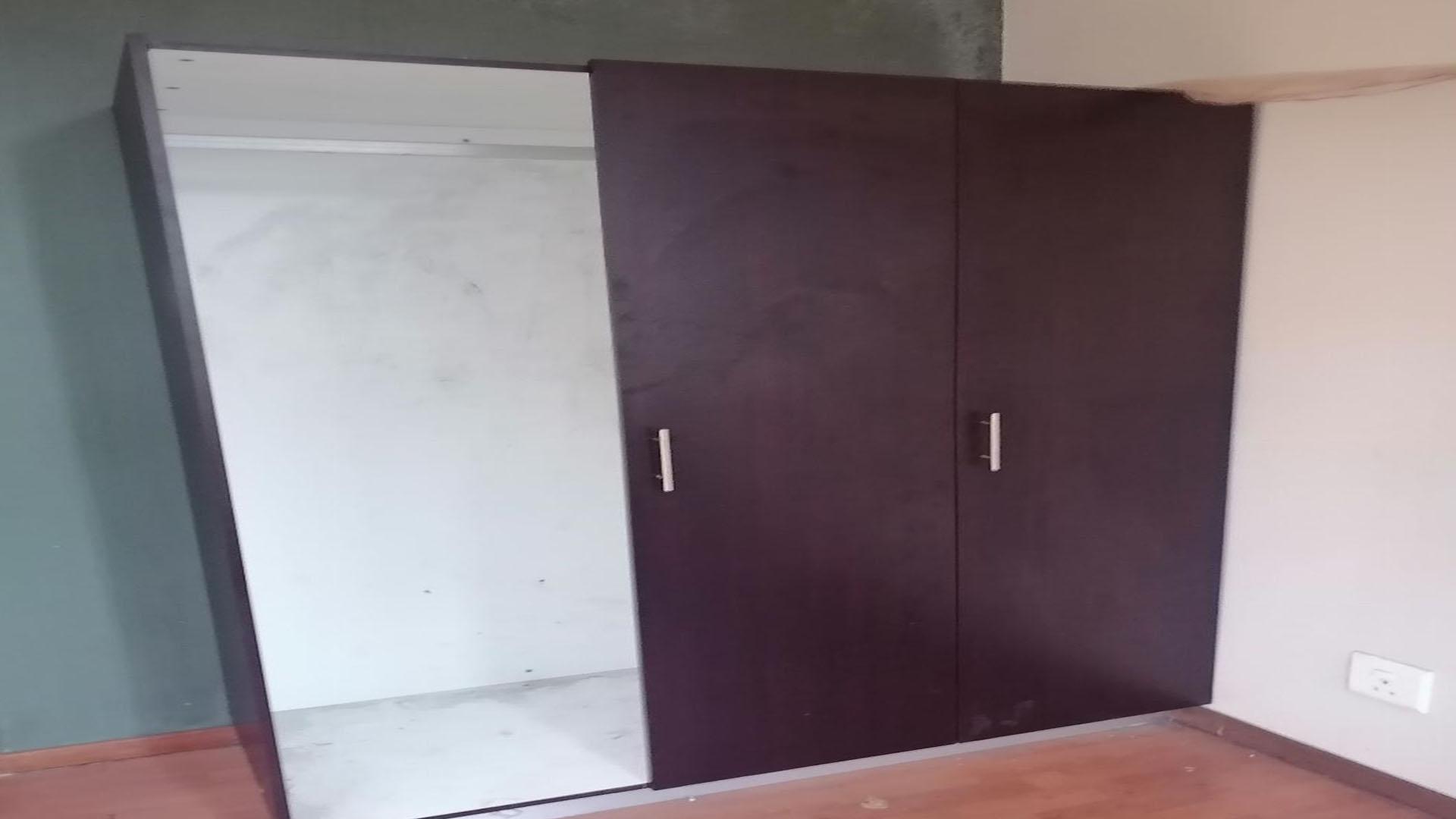 Bed Room 1 of property in Johannesburg Central