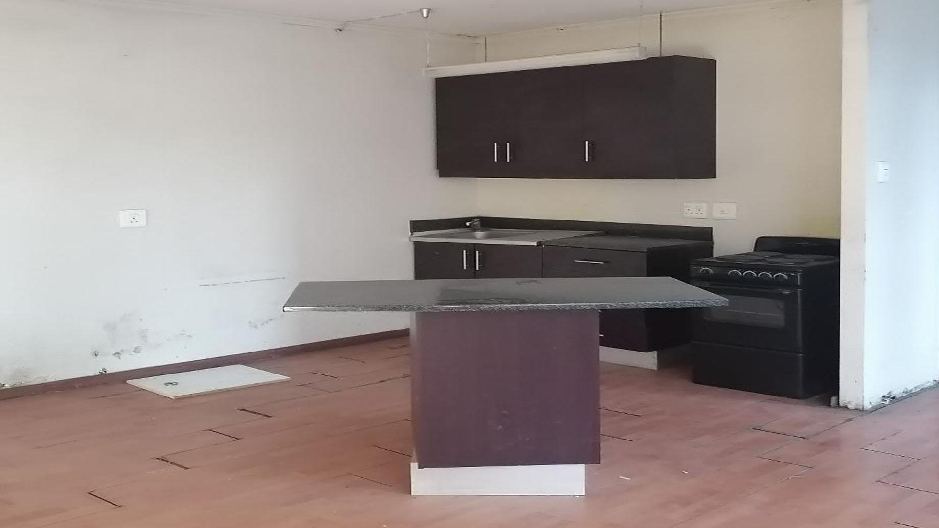 Kitchen of property in Johannesburg Central