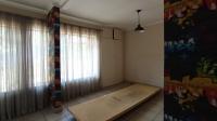Bed Room 1 - 21 square meters of property in Highway Gardens