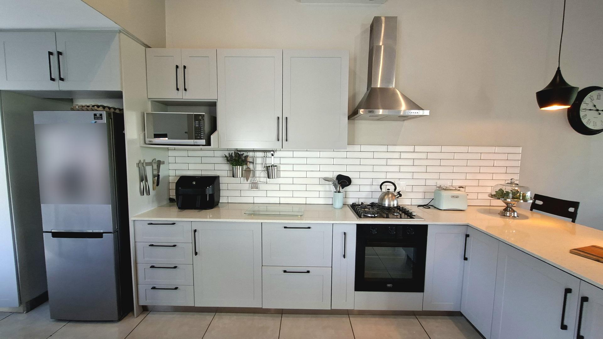 Kitchen of property in Palm Lakes Family Estate