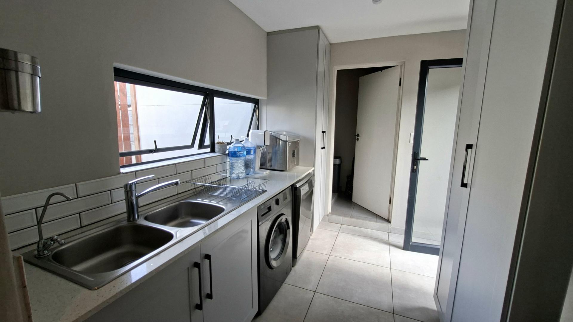 Kitchen of property in Palm Lakes Family Estate