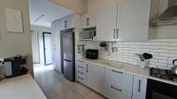 Kitchen of property in Palm Lakes Family Estate
