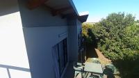 Backyard of property in Palm Lakes Family Estate