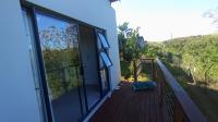 Backyard of property in Palm Lakes Family Estate
