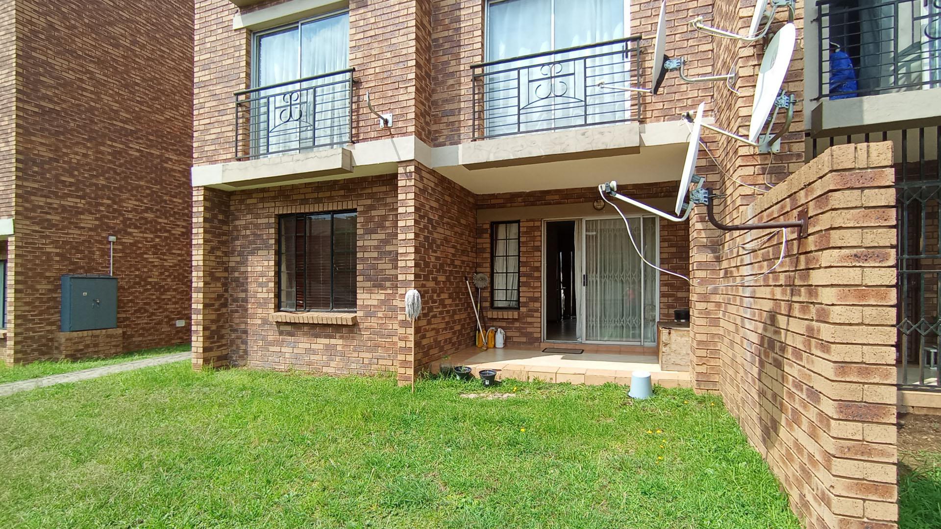 Backyard of property in Sagewood