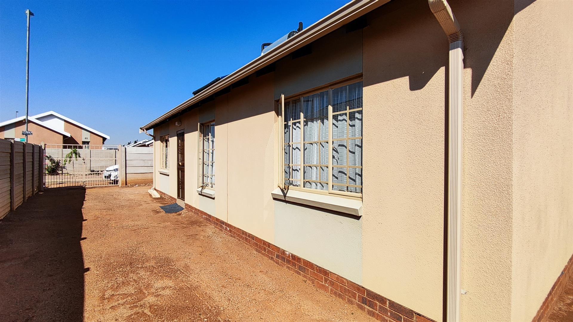 Backyard of property in Palm Ridge