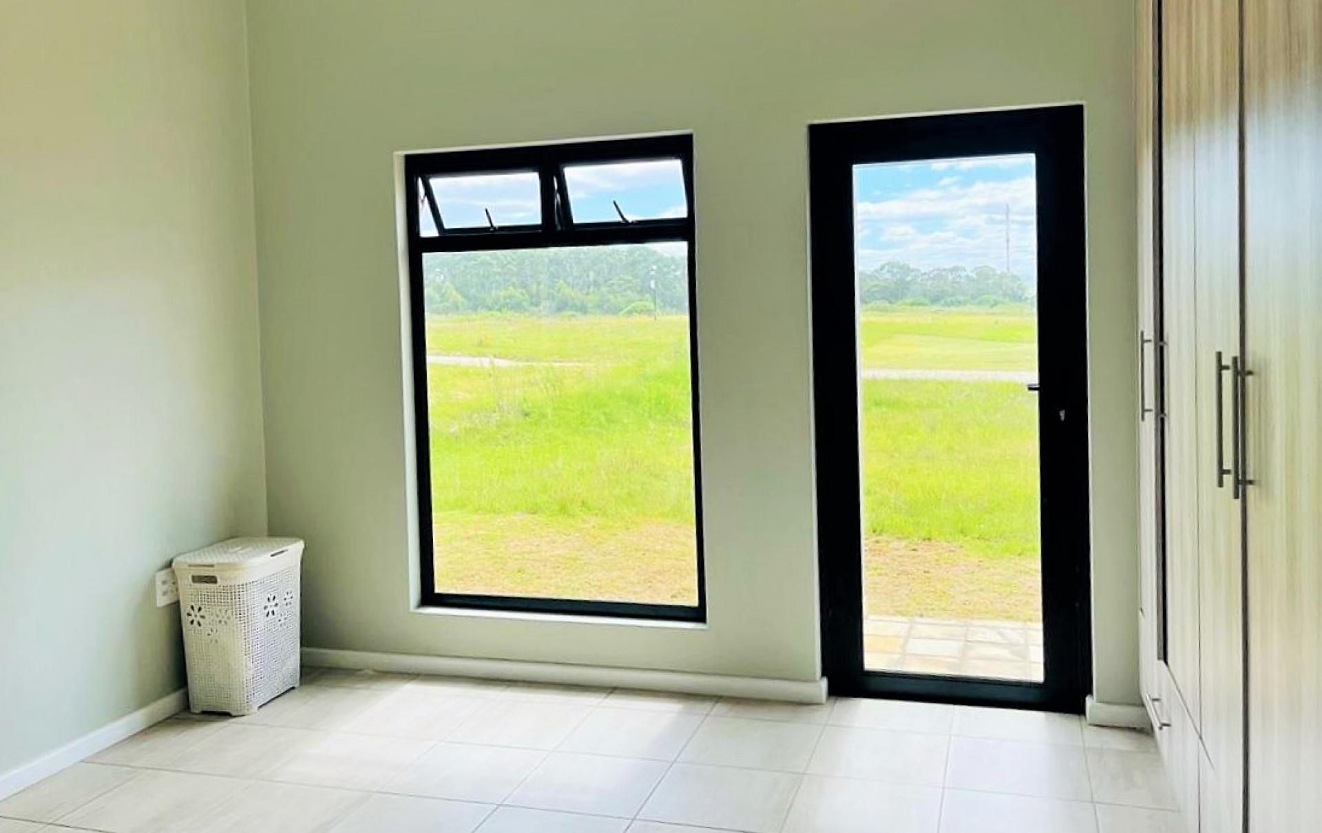 Main Bedroom of property in Kidds Beach