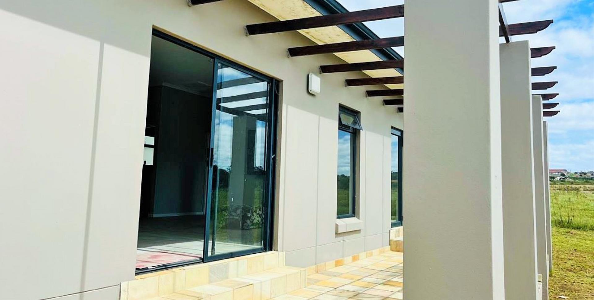 Patio of property in Kidds Beach