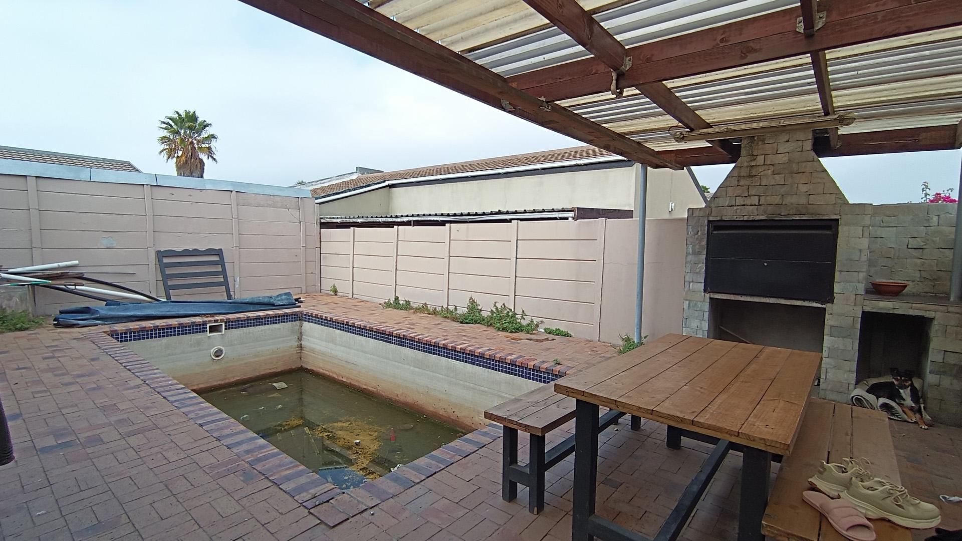 Backyard of property in Summer Greens