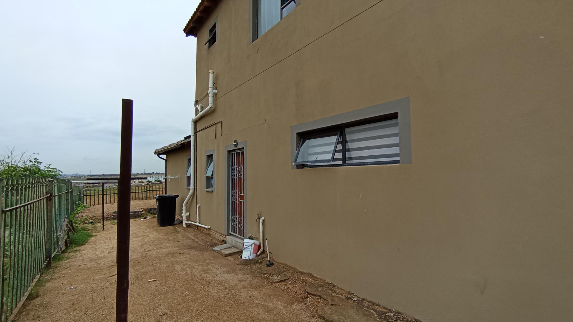 Backyard of property in Riverside View