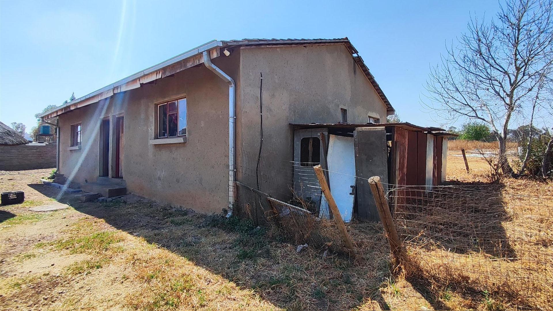 Backyard of property in Homestead Apple Orchards AH