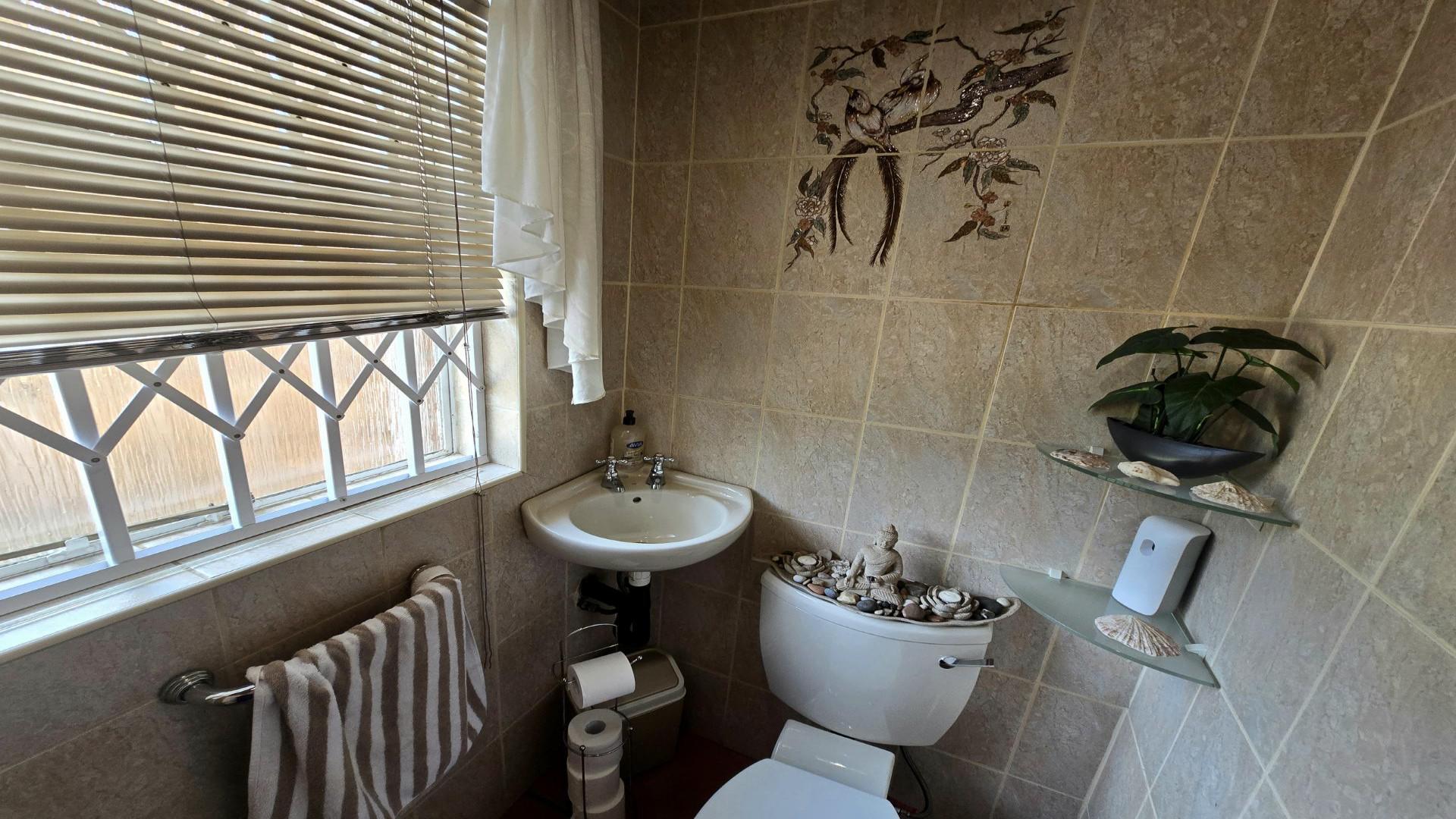 Guest Toilet of property in Golf View 