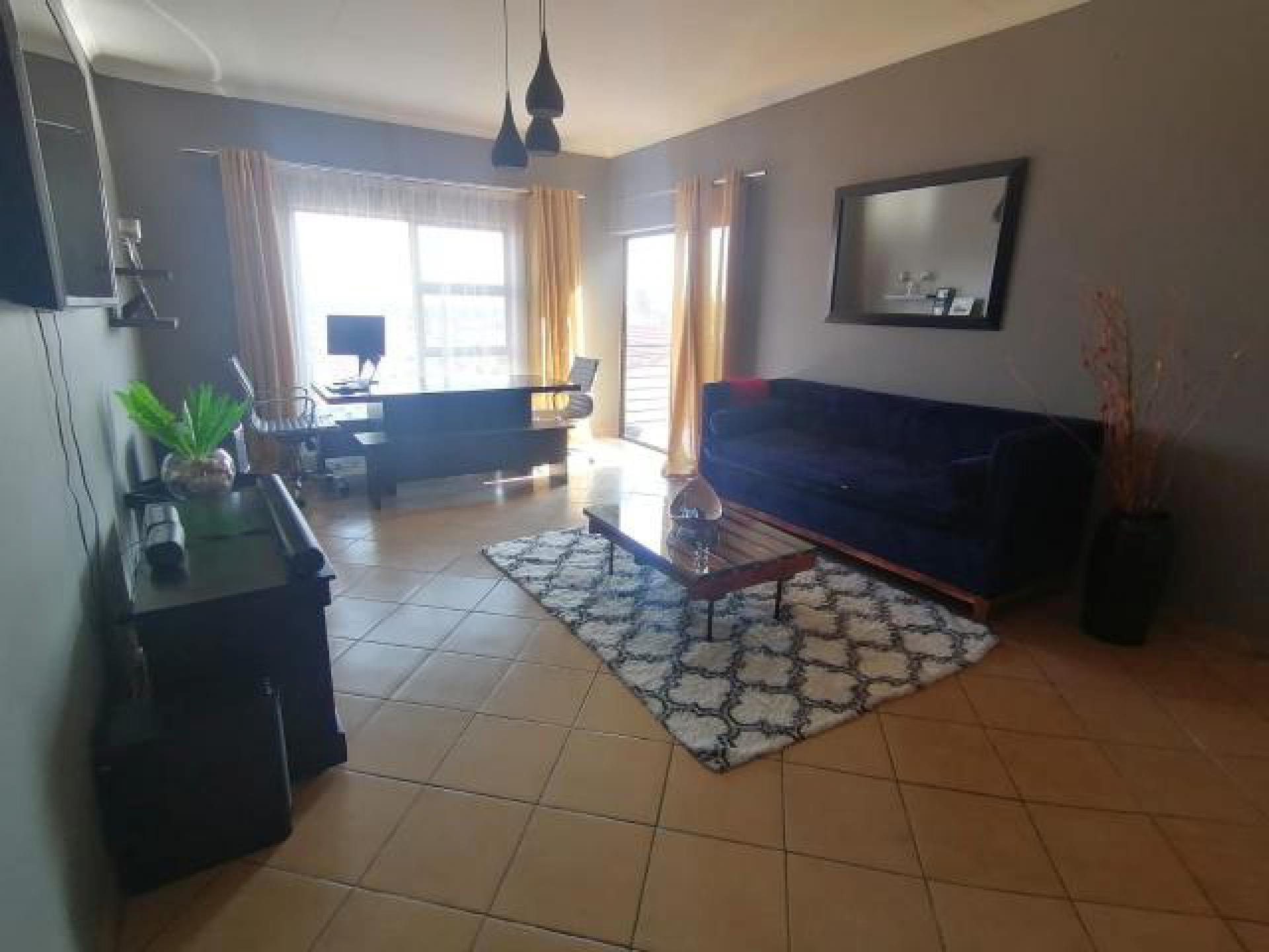 Lounges - 19 square meters of property in Naturena