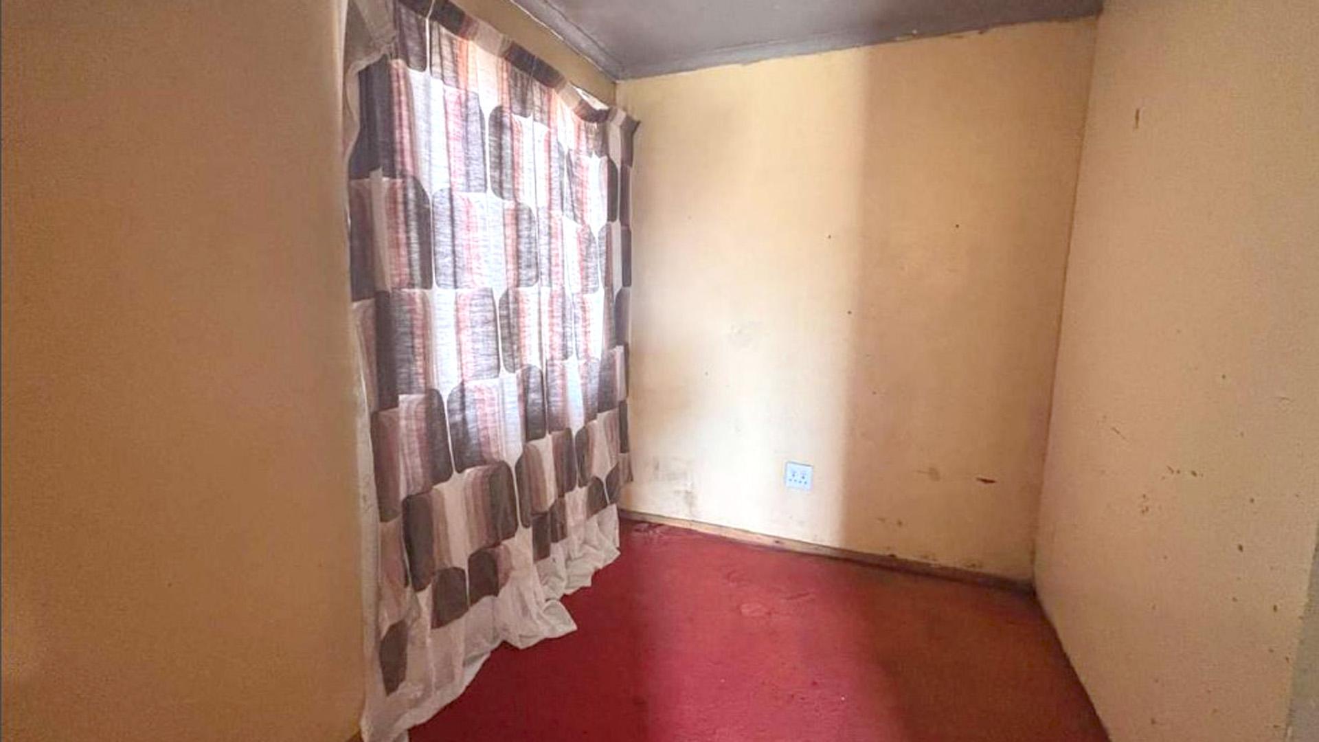 Bed Room 1 of property in Toekomsrus