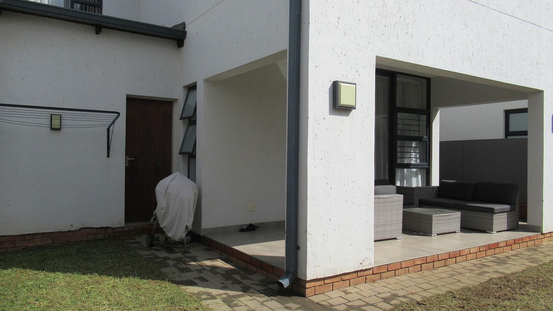 Backyard of property in Homes Haven