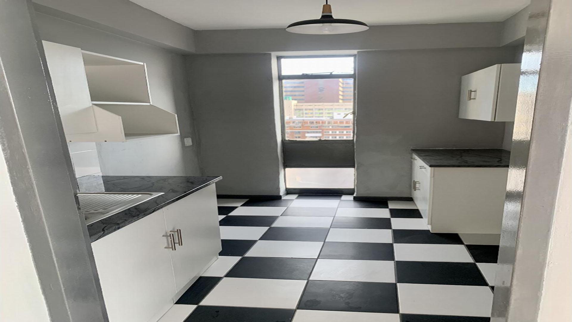 Kitchen of property in Johannesburg Central