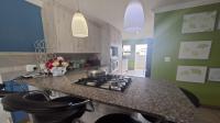 Kitchen of property in Rooihuiskraal North
