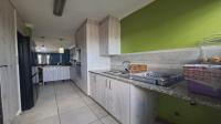 Kitchen of property in Rooihuiskraal North