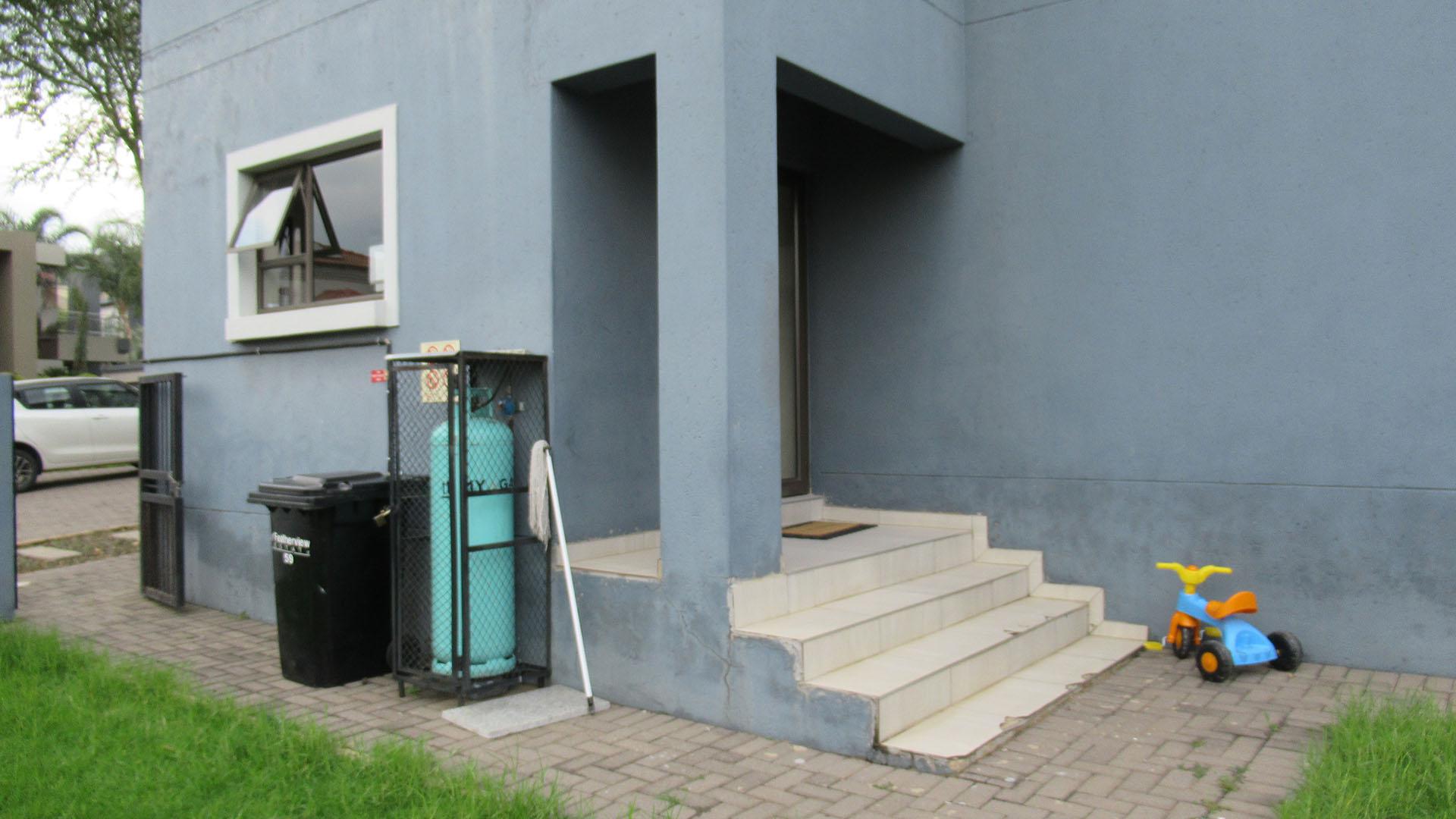 Backyard of property in Homes Haven