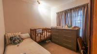 Bed Room 1 of property in Langenhoven Park